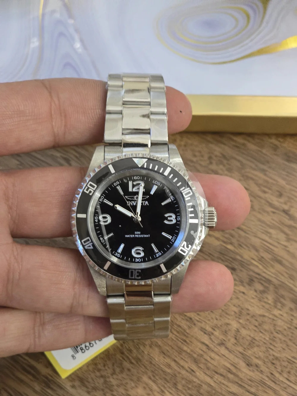 Invicta Silver Stainless Steel Watch with Black Dial and Bezel